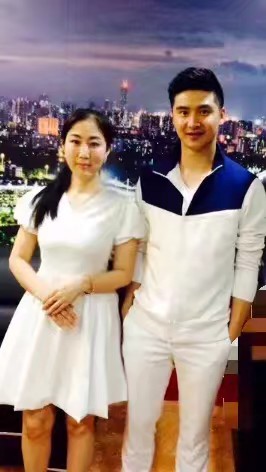 高潔與田亮合影